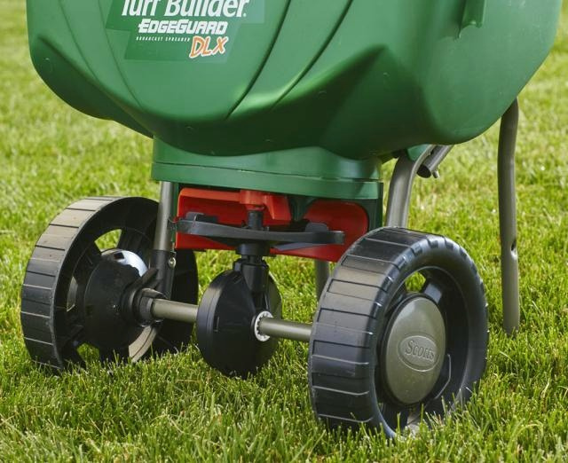 Scotts Turf Builder EdgeGuard DLX Broadcast Spreader - Holds up to 15,000 sq. ft. of Scotts lawn product